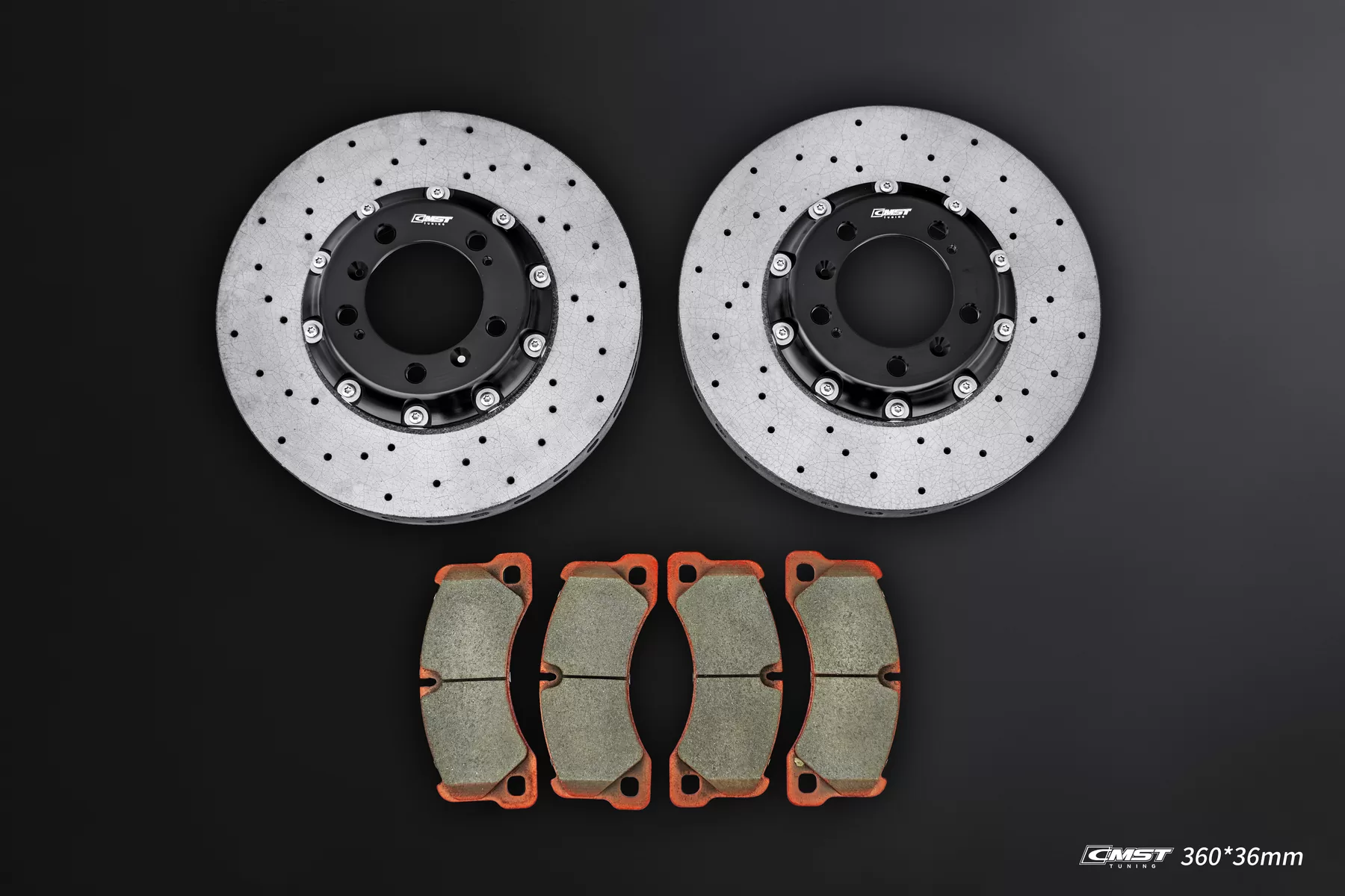 A pair of CMST 360 by 36 mm carbon-ceramic brake discs with four brake pads